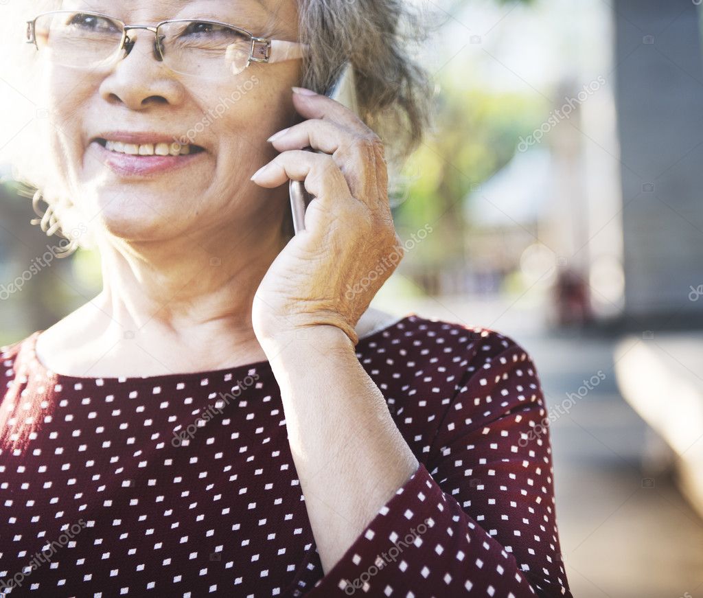 elderly woman with mobile phone