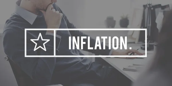 Homme d'affaires penser avec l'inflation texte — Photo