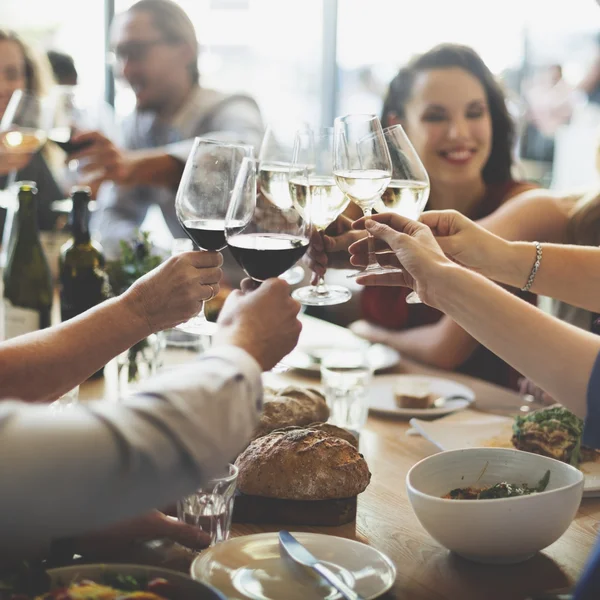 People cheers with glasses — Stock Photo, Image