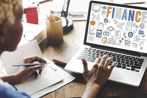 Woman working on laptop with finance — Stock Photo, Image