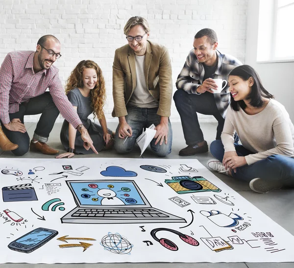 Designers working with poster and multimedia — Stock Photo, Image