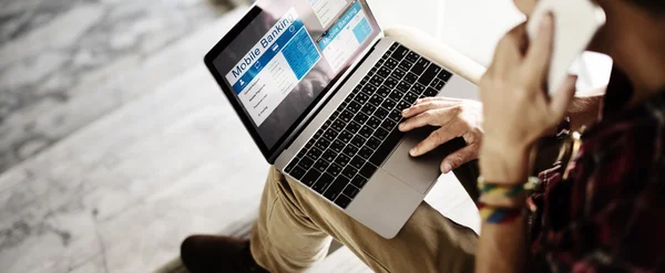 Laptop with mobile banking on screen — Stock Photo, Image