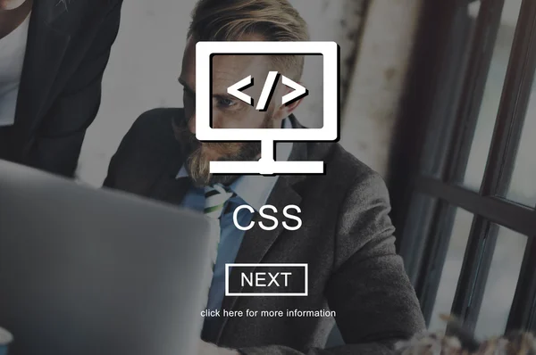 Business man working and css code — стоковое фото