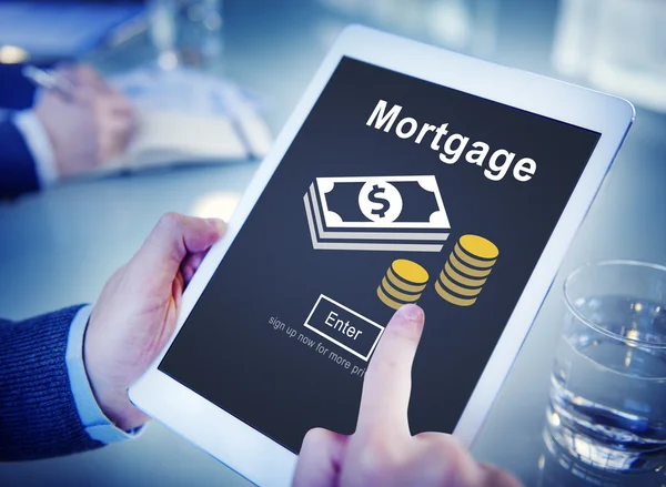 Man using tablet and Mortgage Concept — Stock Photo, Image