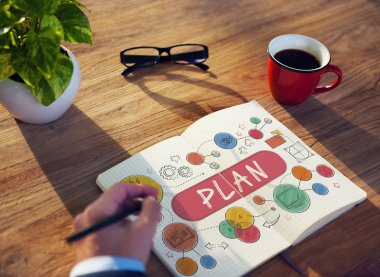 Defterde yazan iş adamı