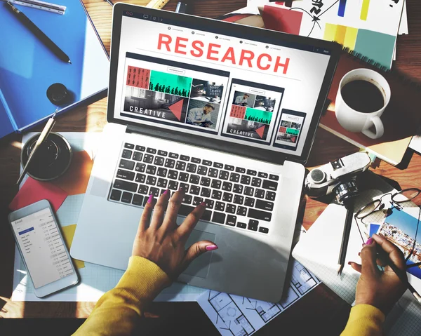 Laptop with research on screen — Stock Photo, Image