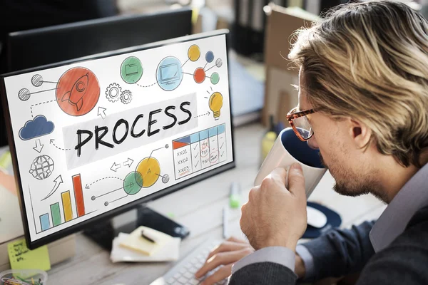 Businessman working on computer with process — Stock Photo, Image