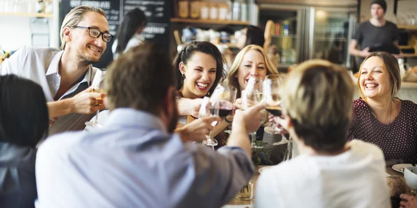 People cheers with glasses — Stock Photo, Image