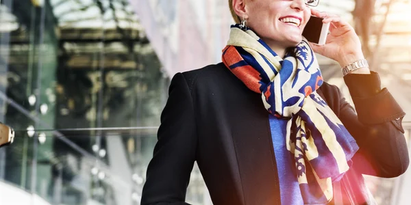 Businesswoman with digital device — Stock Photo, Image