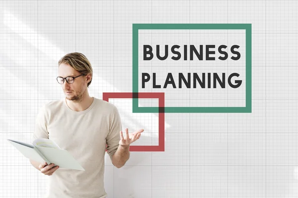 Businessman working with business plan — Stock Photo, Image