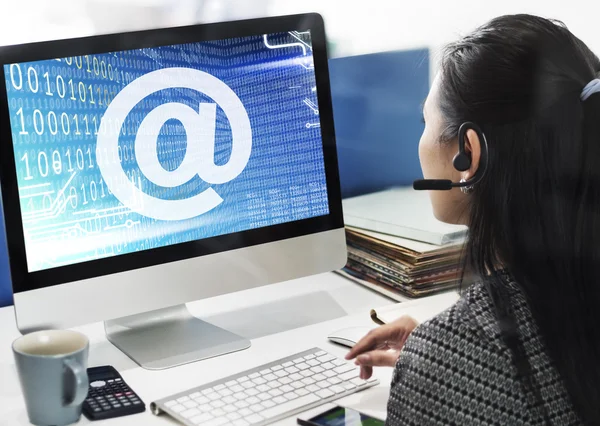 Computer with at on monitor — Stock Photo, Image