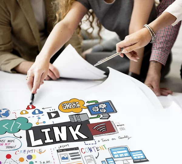 Designers working with poster and links — Stock Photo, Image