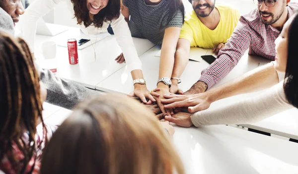 Equipo alegre Unirse a las manos —  Fotos de Stock