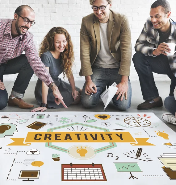 Designers working with poster and creativity — Stock Photo, Image