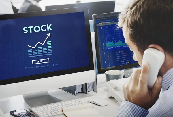 Computer with stock on monitor — Stock Photo, Image