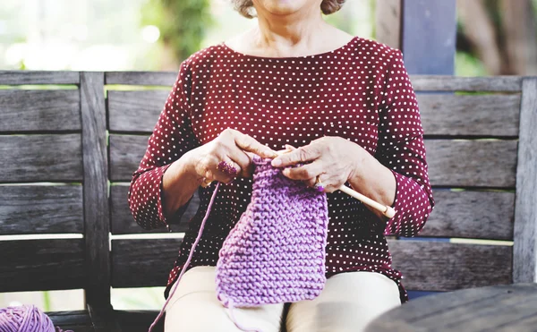 Grandma crocheting Concept — стоковое фото