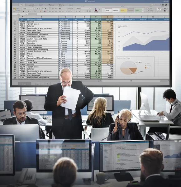 Business workers and spreadsheet — Stock Photo, Image