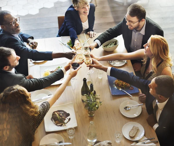 People cheers with glasses — Stock Photo, Image