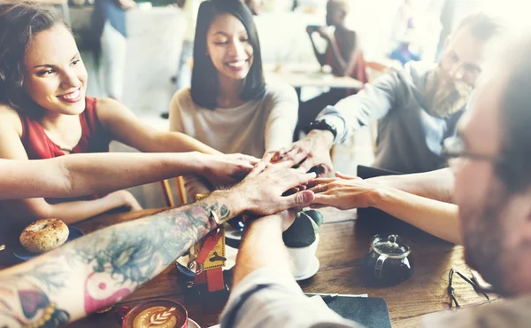 People making pile of hands — Stock Photo, Image