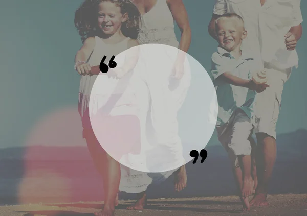 Family having fun on the beach — Stock Photo, Image