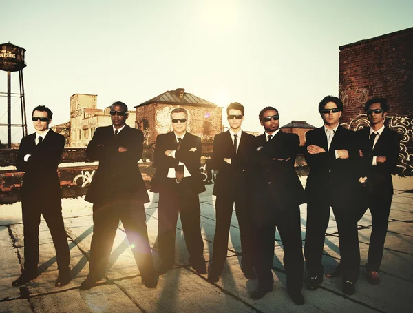 Business-Team i svarta kostymer — Stockfoto