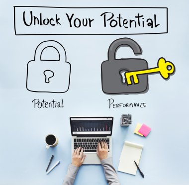 Laptop on table with unlock your potential  clipart