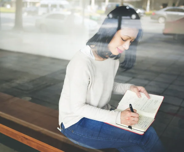 Asiatic Lady Writing in Notebook — Fotografie, imagine de stoc