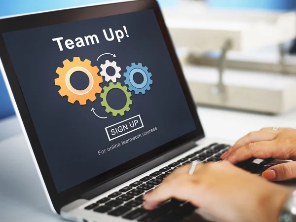 Team Up op monitor laptop — Stockfoto