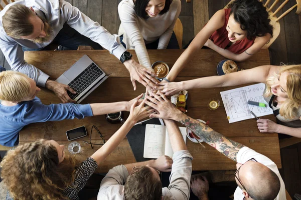 People making pile of hands — Stock Photo, Image