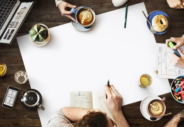 Table with blank poster — Stock Photo, Image