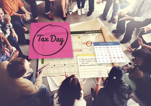 People over poster with Tax Day — Stock Photo, Image