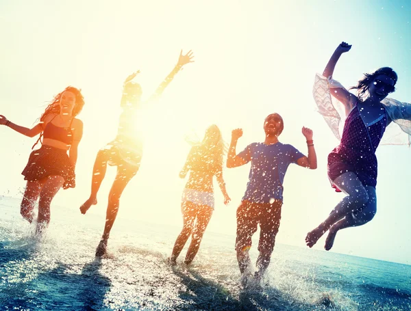 Friends hanging out on party and jumping — Stock Photo, Image