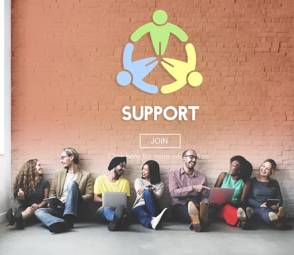 Diversity friends near wall with support — Stock Photo, Image