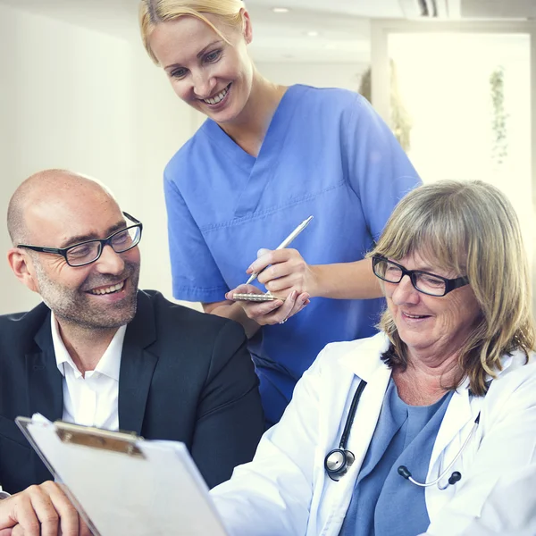 Group of doctors at meeting — Stock Photo, Image