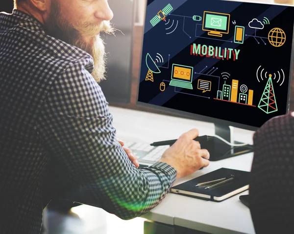 Computer with mobility on monitor — Stock Photo, Image