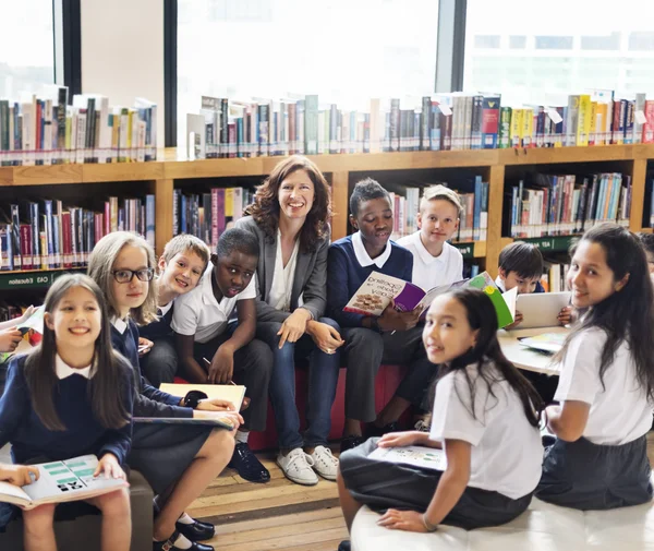 woman teacher having lesson with pupils