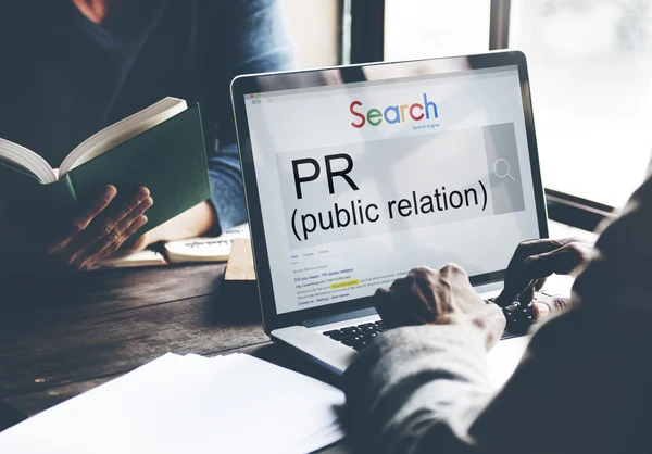 Public relations on computer monitor — стоковое фото