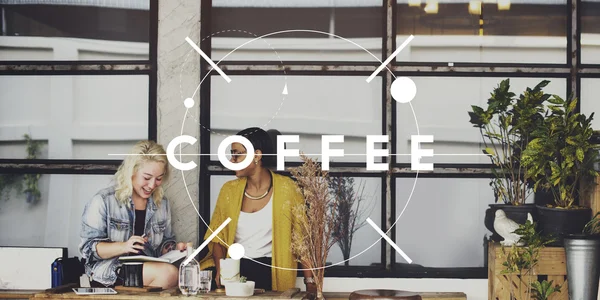 Women sitting near cafe and coffee — Stock Photo, Image