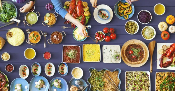 Friends eating for big table — Stock Photo, Image