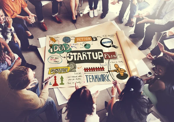 People over poster with startup — Stock Photo, Image