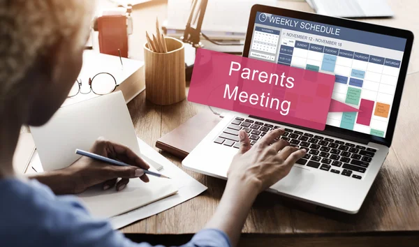 Woman working on laptop with meeting — Stock Photo, Image