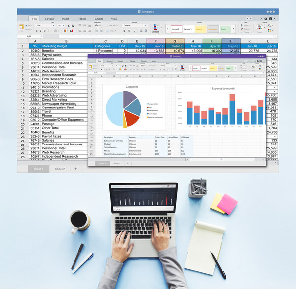 Laptop on table with business