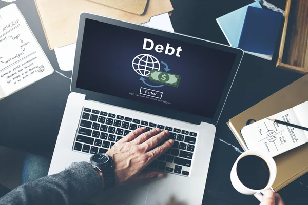 Laptop with debt concept — Stock Photo, Image