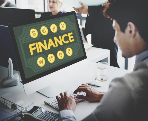 Businessman working on computer and finance — Stock Photo, Image