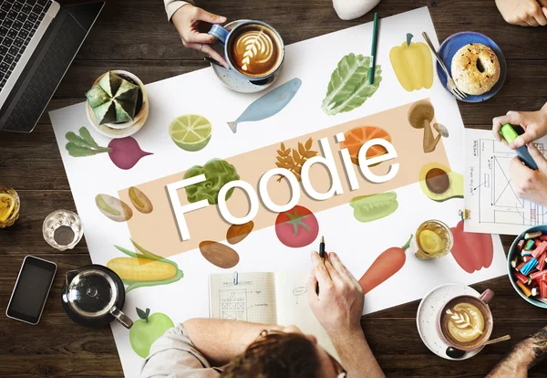 Tabel met poster met Foodie — Stockfoto