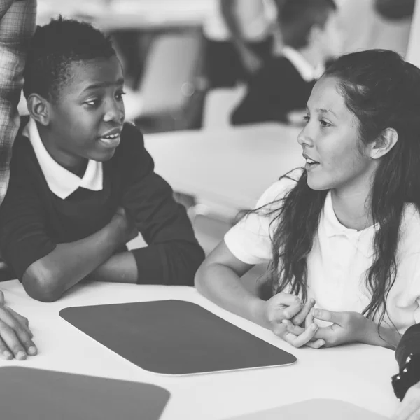 Pupils having lesson at school classroom — Stock fotografie