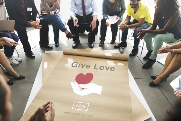 Pessoas sobre cartaz com GiveLove — Fotografia de Stock