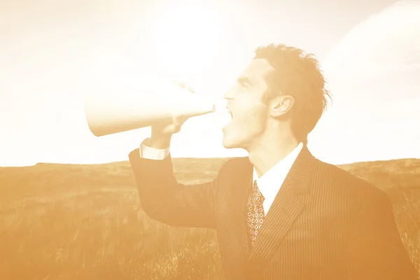 Businessman in suit with Megaphone — Stock fotografie