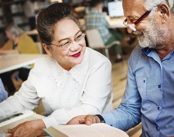 Middle aged people studying together — Stock Photo, Image