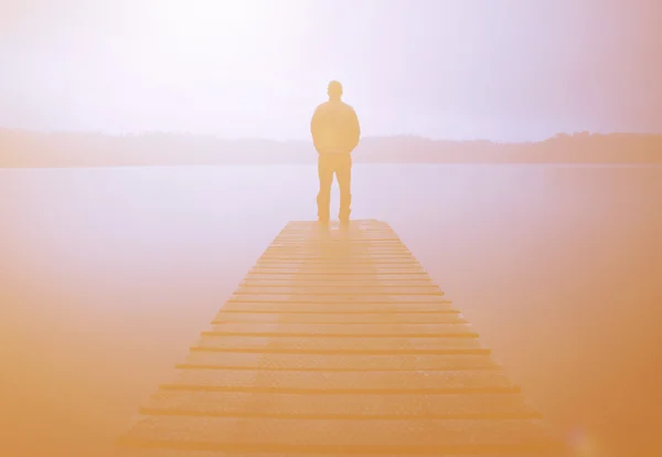 Man Standing on a Jetty — Stock fotografie